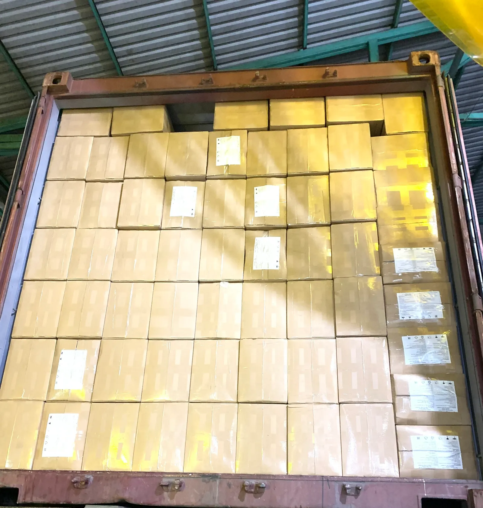 Container fully loaded with cashew cartons, ready to export